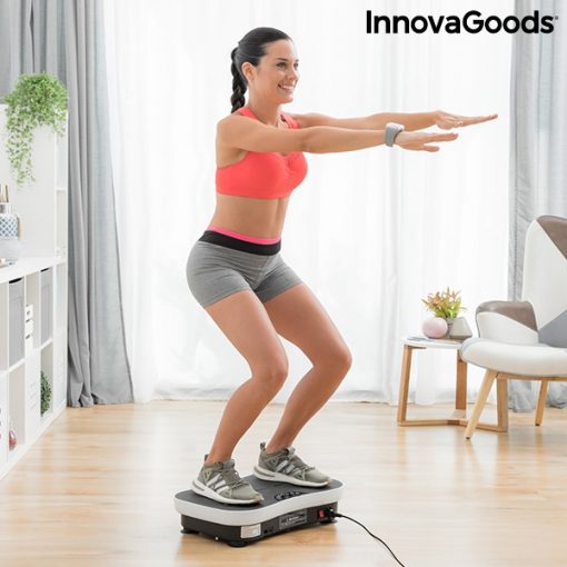 Plateforme vibrante avec elastiques femme exercice squat