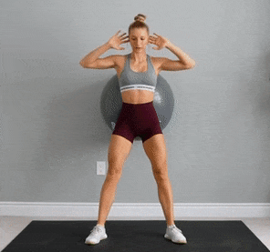 exercice ballon pilates squat contre mur